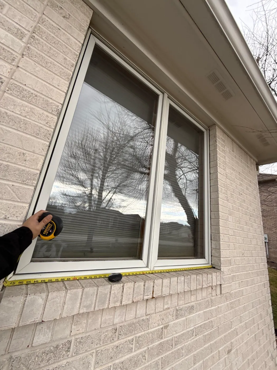 Frame and seal detail on a New Palestine window job